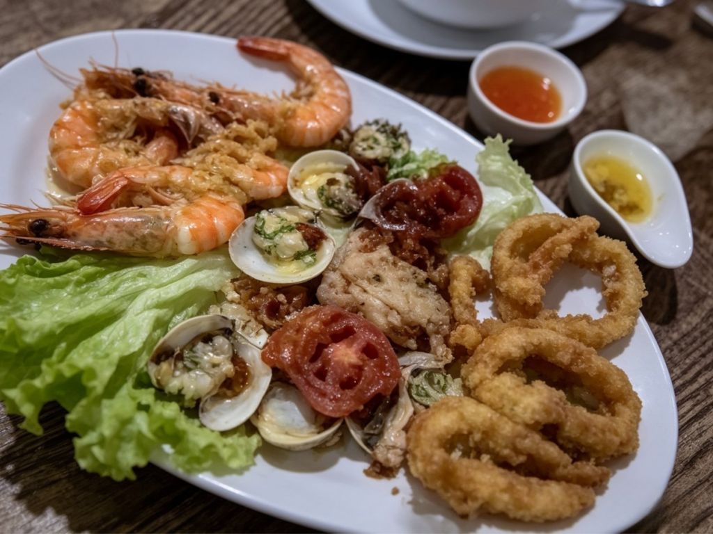 A seafood platter with prawns, clams and calamari