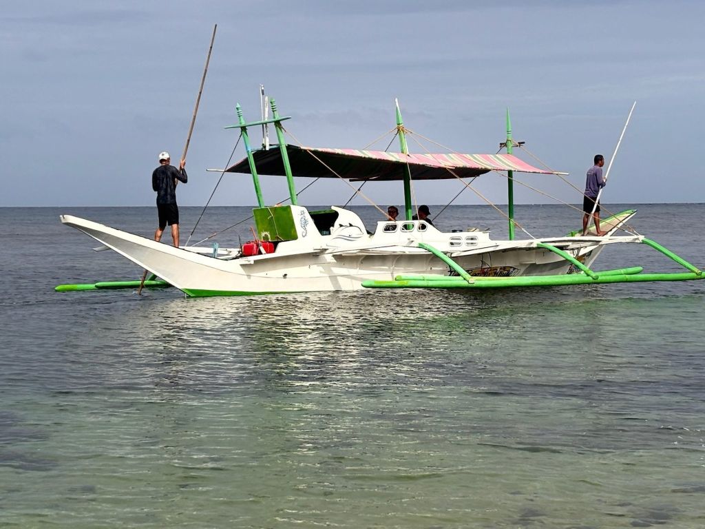 Fishing from a bangka in calm water