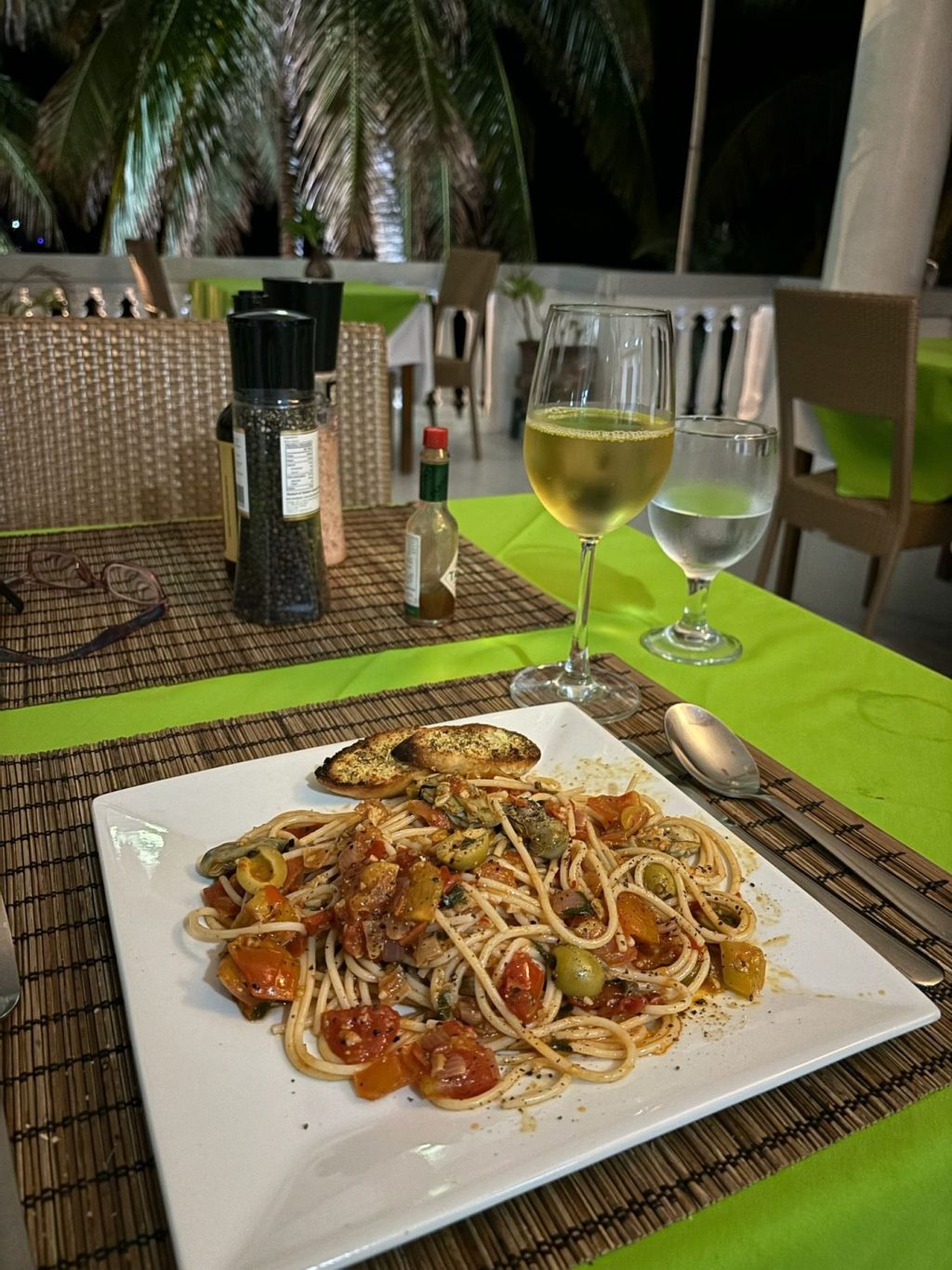 Seafood pasta with a glass of white wine
