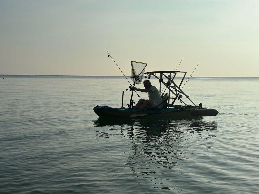 Fishing from the Pelican pedal kayak at dawn
