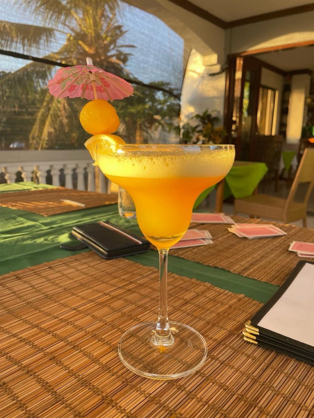 A mango cocktail on the balcony