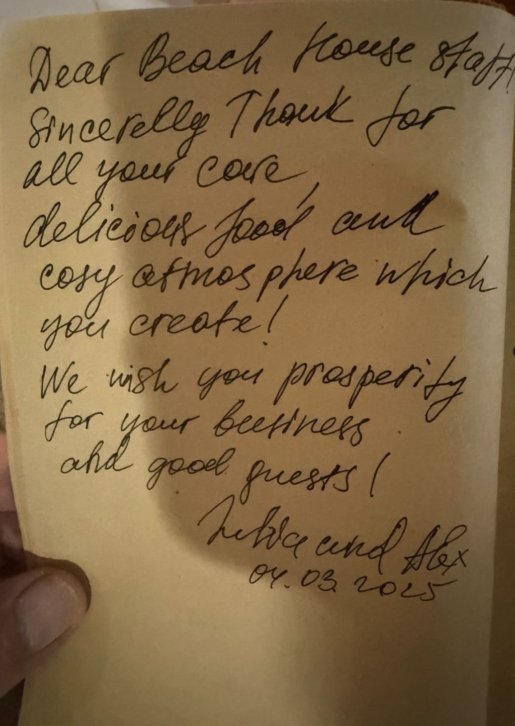 A handwritten thank-you note from Yulia and Alex in our guestbook