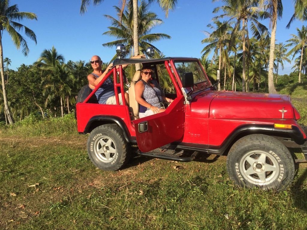 Guests on an island tour in our Jeep